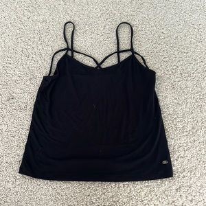 Soft black tank with cool front detailing! Size S